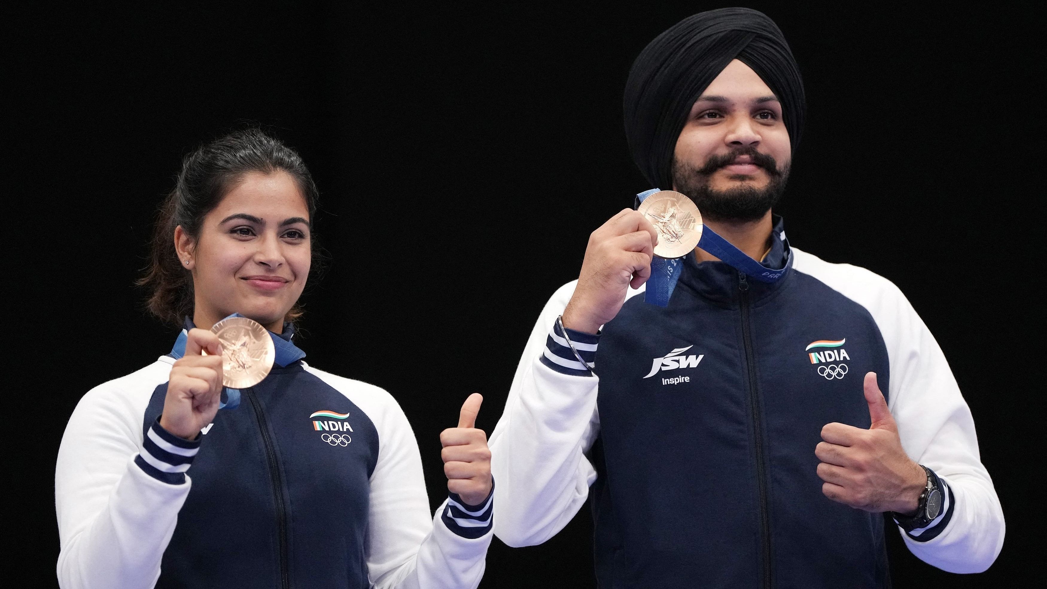 <div class="paragraphs"><p>Manu Bhaker and Sarabjot Singh flaunt their&nbsp;bronze medals.</p></div>